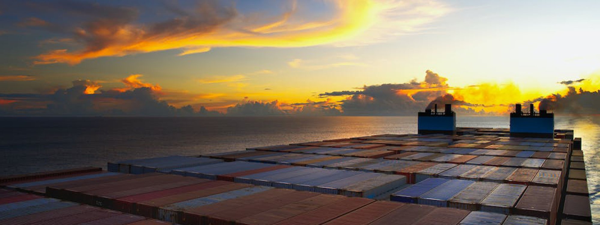Shipping containers being transported by sea